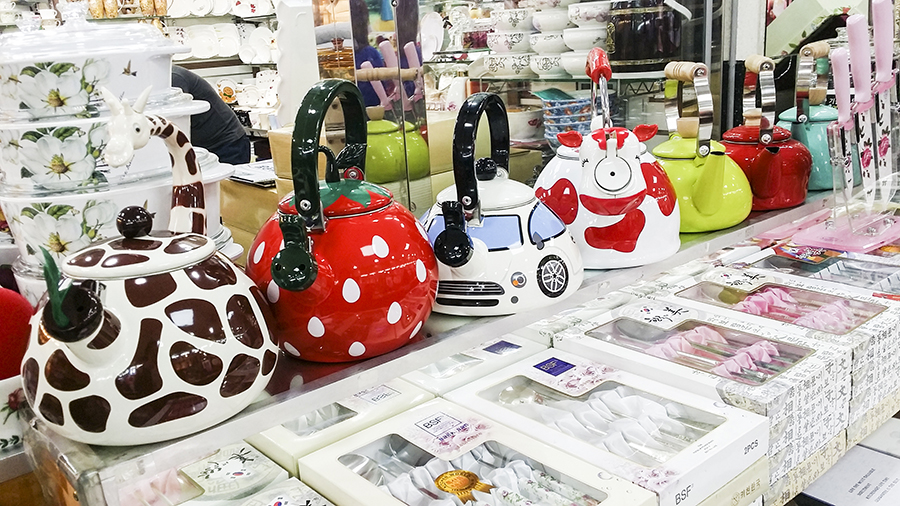 Cute painted water kettles on display at Dongdaemun market, Seoul, South Korea.