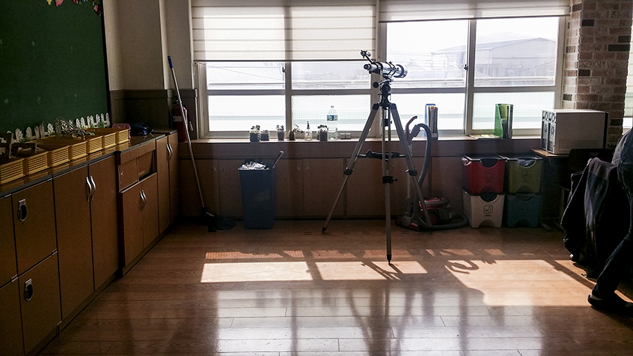 Telescope at the back of a classroom in an elementary school in Sangju, South Korea.