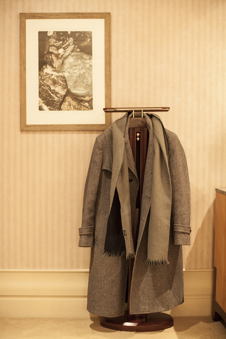 Coat hanging on a coat stand at the Lotte Hotel, Myeongdong, Korea