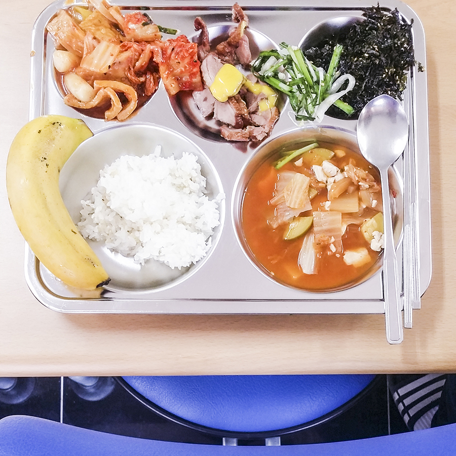 School lunch of kimchi, pork, seaweed / laver in Sangju, South Korea.