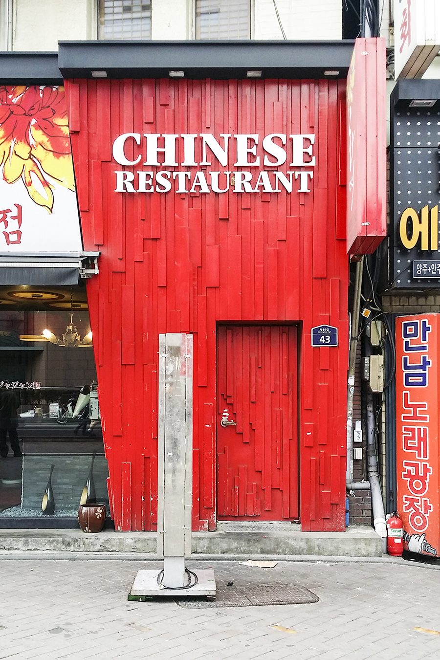 Chinese Restaurant in the shape of a chinese takeaway box in Myeongdong, Seoul, South Korea.