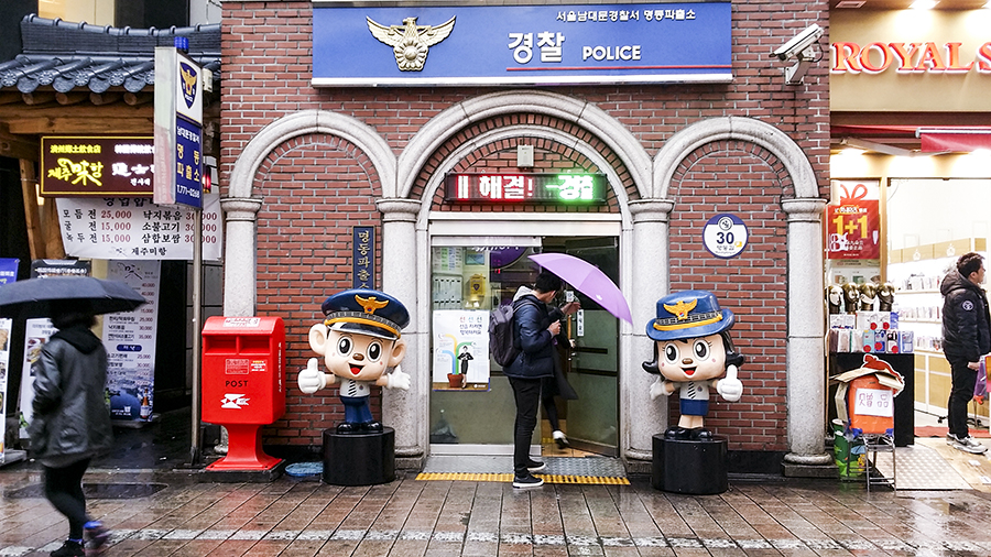 Cute statues of policemen mascots outside a police station in Myeongdong, Seoul, South Korea.