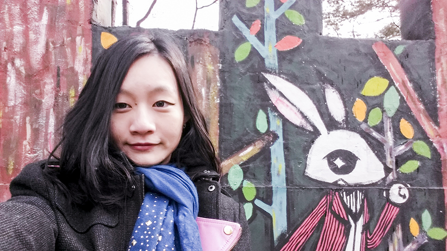 Selfie with cute bunny on the walls of a castle structure at Nami Island, Gapyeong, South Korea.