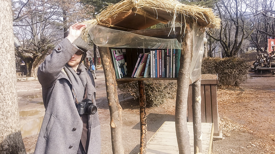 Ottie discovering a library stand at Nami Island, Gapyeong, South Korea.
