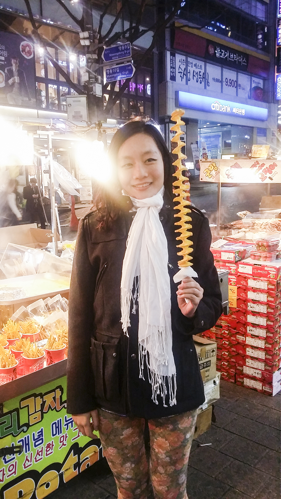 Me with a twistie potato stick in Myeongdong, Seoul, South Korea.