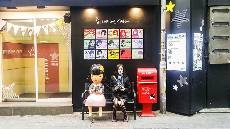 Picture with cute statue outside Miss Lee Cafe in Myeongdong, Seoul, South Korea.