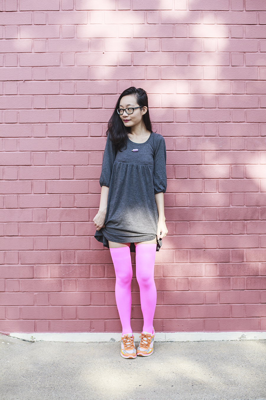 We Love Colors Outfit: We Love Colors neon pink thigh high stockings, Skechers neon sneakers, Forever 21 grey babydoll dress,  old school potong ice cream pin, Gap black rimmed glasses.