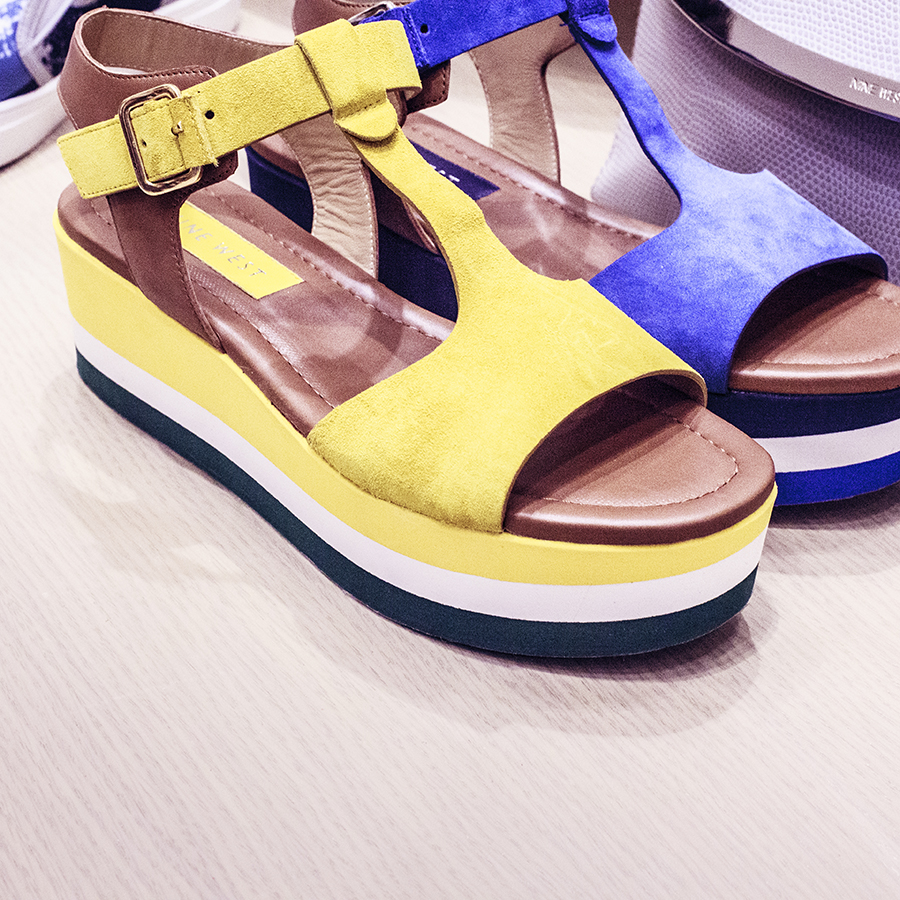 Blue and yellow strappy platform sandals at the Nine West SS15 Collection launch preview at Suntec, Singapore.