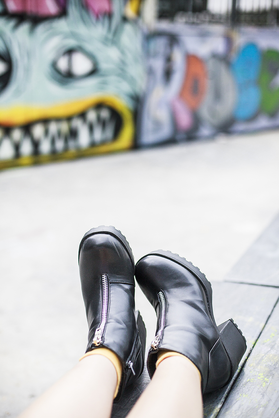 Rubi black platform heeled boots via Zalora