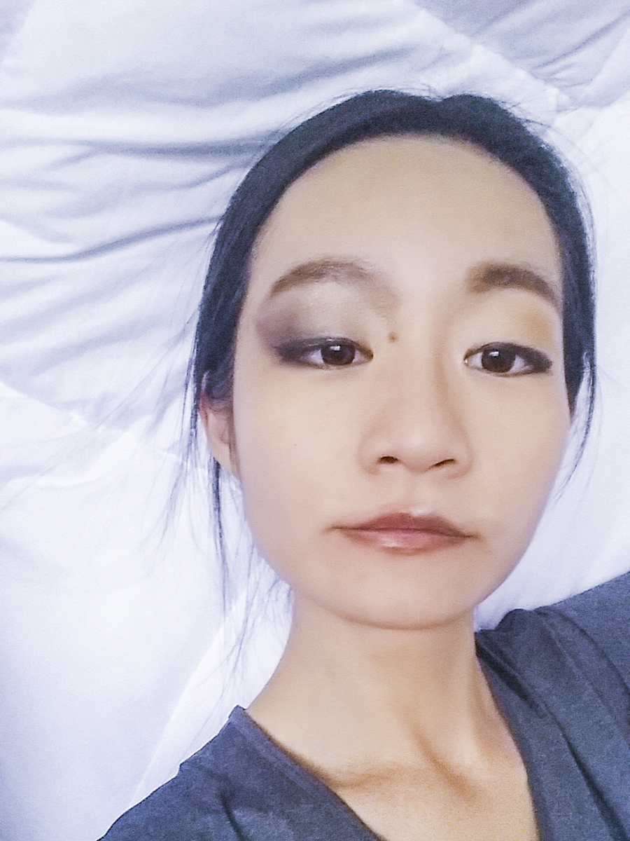 Half-face makeup.