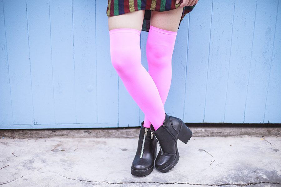 Bohemian Rhapsody Outfit: Urban Outfitters striped off-shoulder dress, We Love Colors neon pink thigh high stockings, Rubi black platform zipper boots.