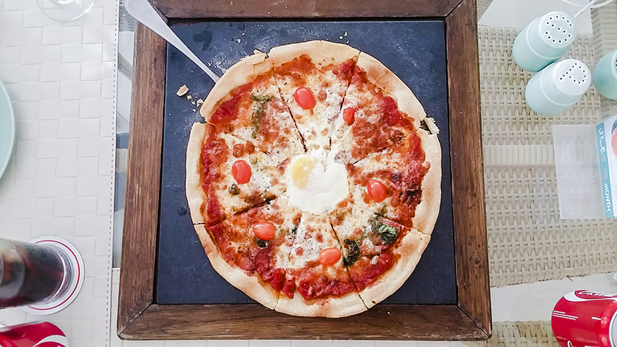 Wood-fired thin crusted pizza at Harris Waterfront Resort, Batam, Indonesia.