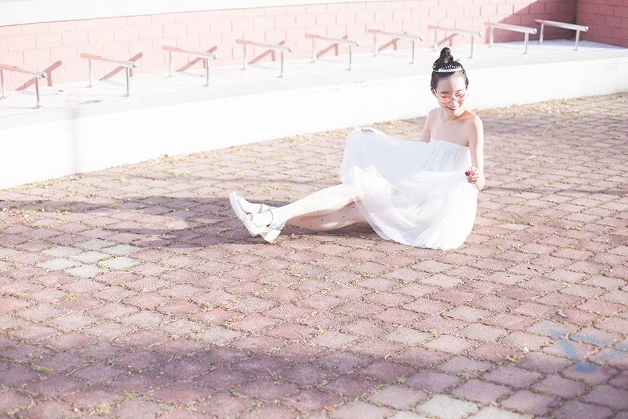 Princess outfit: Irresistible Me silver Aurora Tiara hair accessory, DressLink white tulle tutu skirt, Sunmill heart print tights from Shanghai, Taobao white platform sandals, Guess iridescent sunglasses.