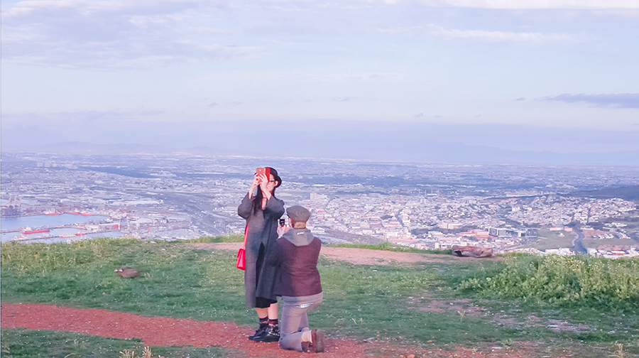 Screenshot of a video showing the surprise engagement proposal atop Signal Hill, Cape Town, South Africa.