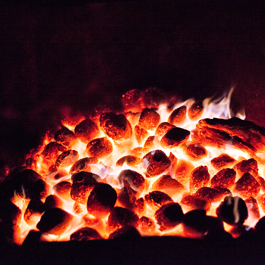 Burning coals on a braai.