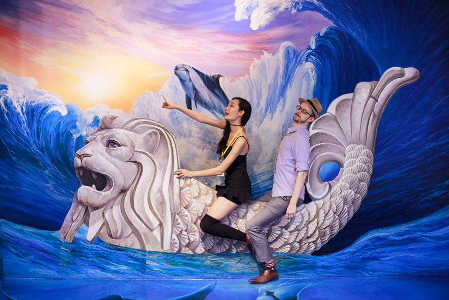 Ren and Ottie going on an adventure at the Merlion trompe-l'œil at the Trick Eye Museum Renewal Event in Singapore, Resorts World Sentosa.