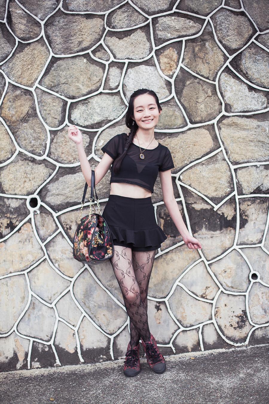 WholesaleBuying mesh crop top, Uniqlo bra, Topshop ribbon lace tights, Dressin floral bag, McQ x Puma high top sneakers, Simply Willow emerald necklace.