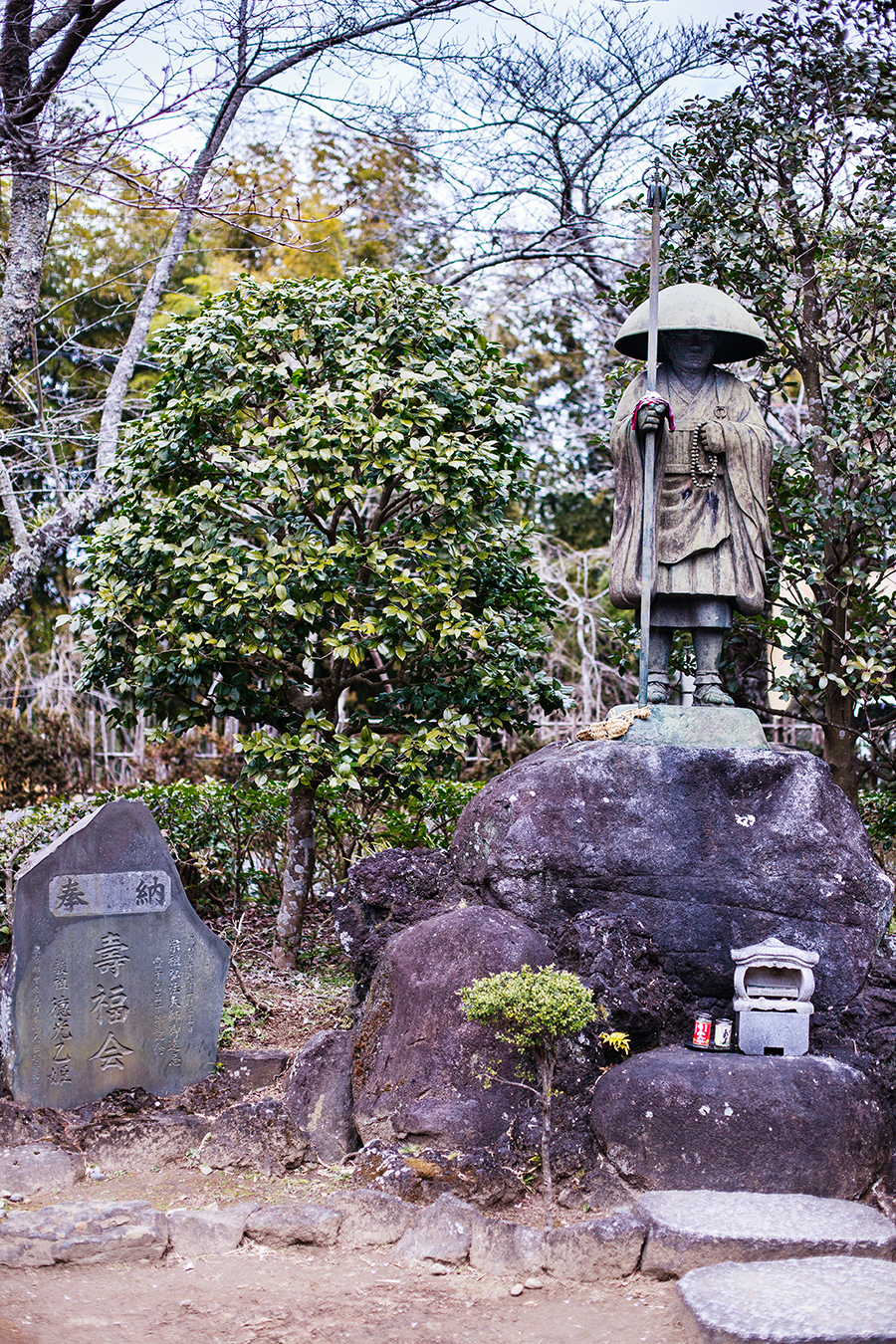 Statue of traveling monk at Shinshoji Narita Temple with the Narita Transit Program in Chiba, Japan 