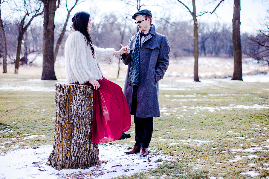 Wedding photoshoot with a smatter of snow on a green field at the Rustic Oaks, Moorhead Minnesota, USA