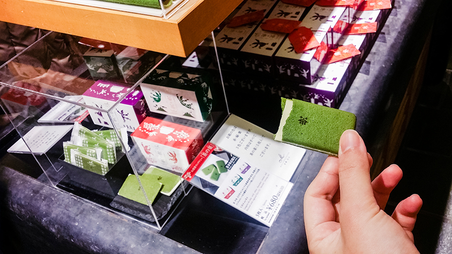 Free green tea matcha sweet sample in Kyoto, Japan.