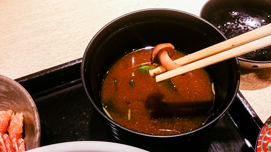 Mushroom in miso soup at Hage Ten tempura don in Kyoto, Japan.