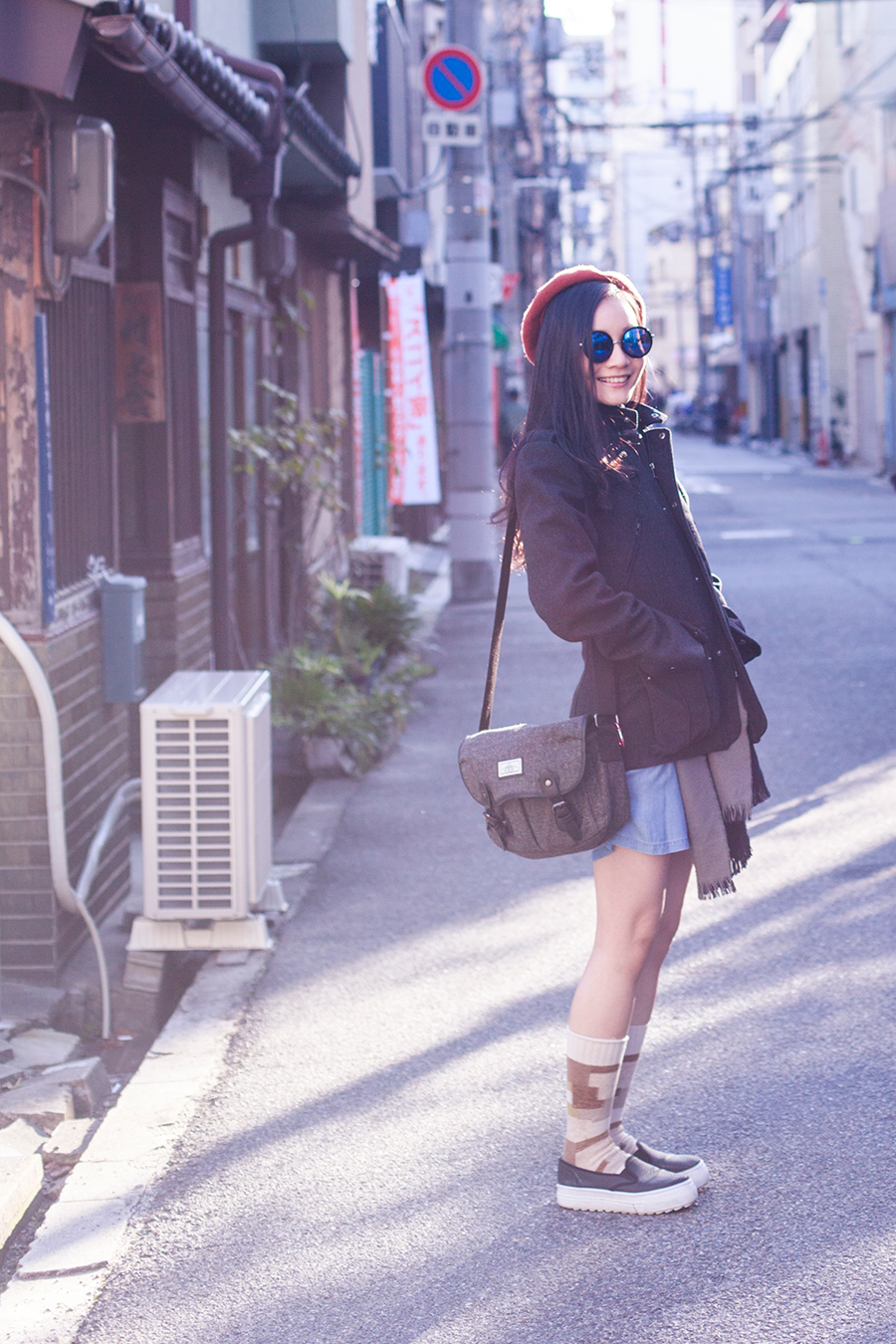 Outfit in Osaka, Japan: Uniqlo denim long-sleeved dress, H&M coat, CNDirect blue round mirror sunglasses, Happy socks tan socks, Spurr Monique sneakers.