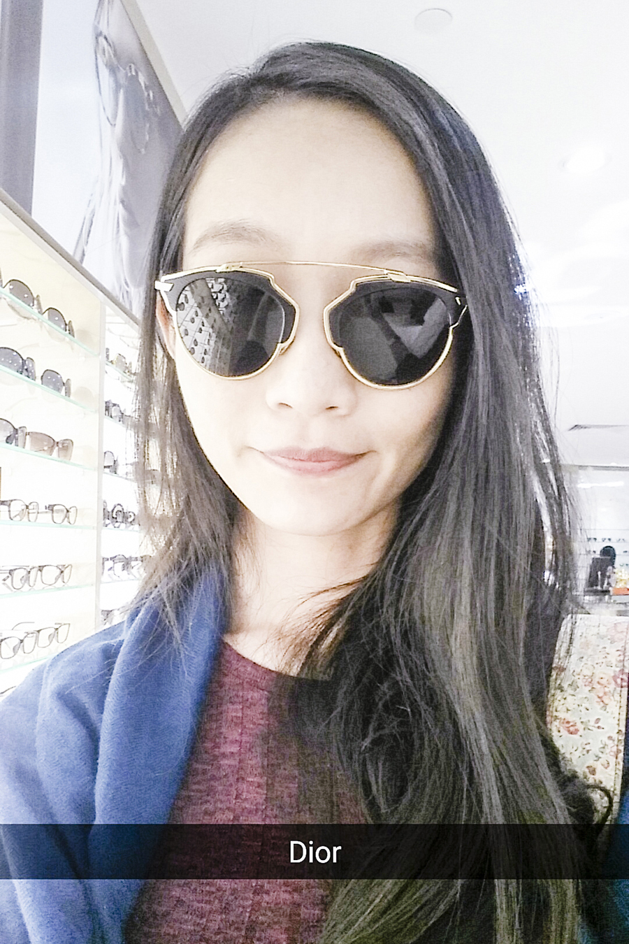 Ren trying out Dio black sunglasses at the Her World x Optic Butler Event, Paragon, Singapore.