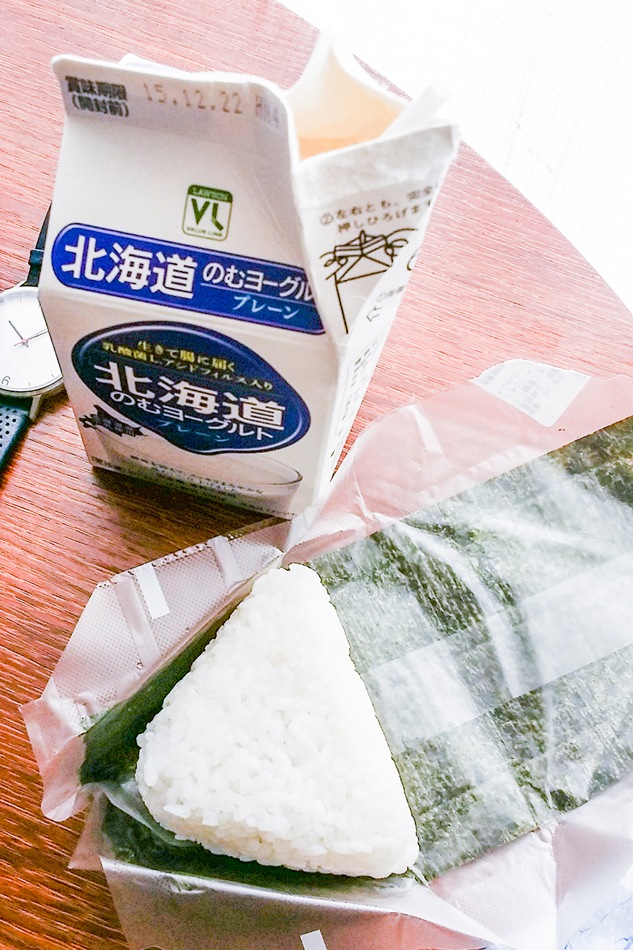 Hokkaido milk yoghurt and onigiri for breakfast in Tokyo, Japan.