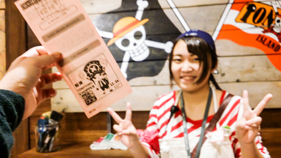 Getting the special Chopper stamp from the Tongari Store Staff at One Piece Tower, Tokyo Tower Japan.