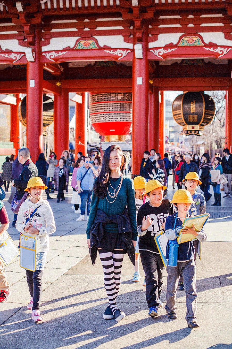 Animated gif of an attempt at an outfit shoot at Asakusa, Tokyo while school children stream past.