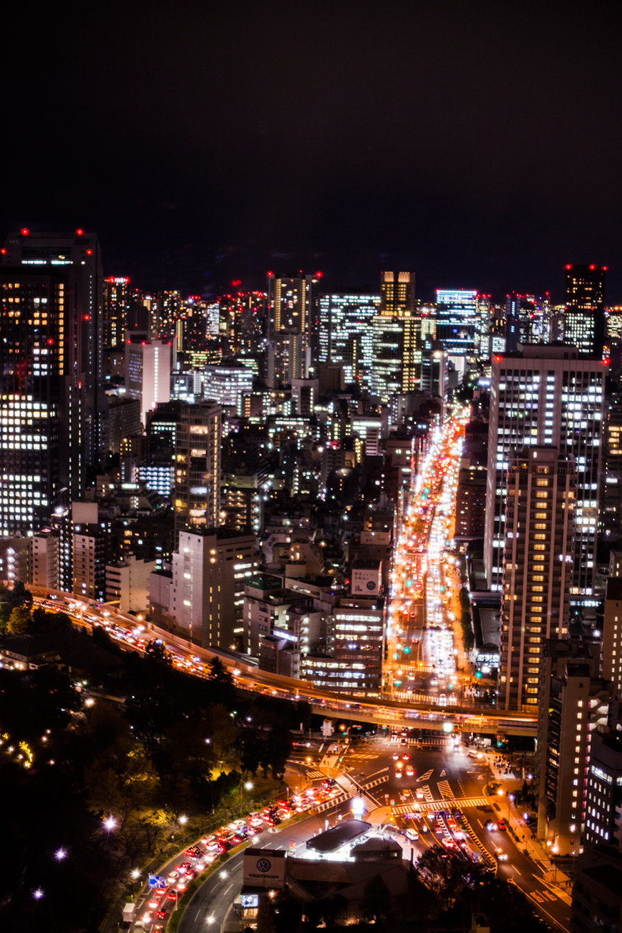 Busy roads in the night cityscape from the Tokyo Tower Observatory.