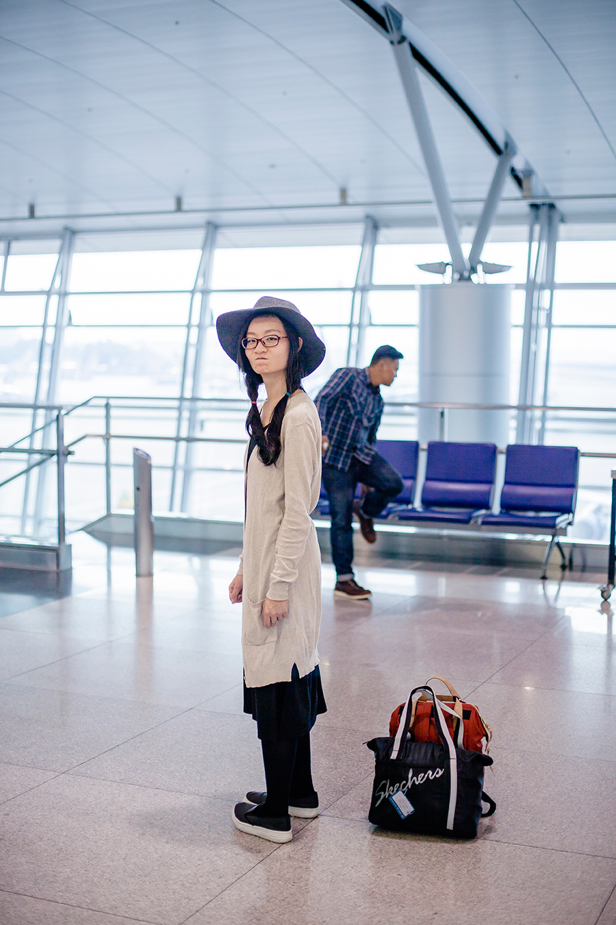 Airport outfit: Zara long cardigan, GU wool hat, Spurr shoes.