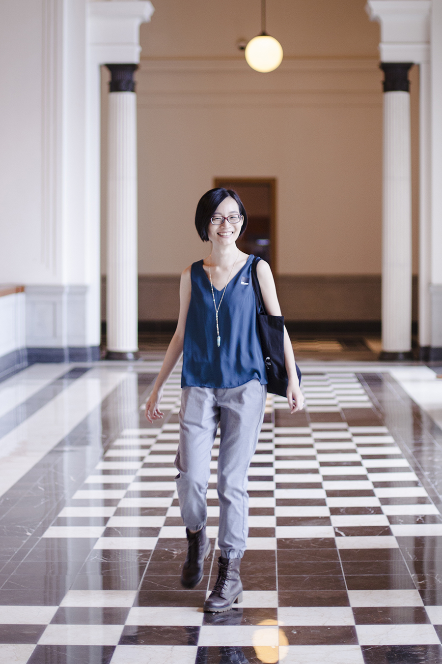 National Gallery Singapore: walking on checkered floor.