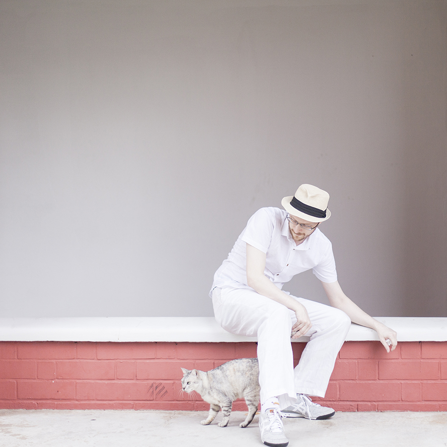 This Guy Ah in monochrome white: Zalora linen white shirt, Onitsuka Tiger grey sneakers.
