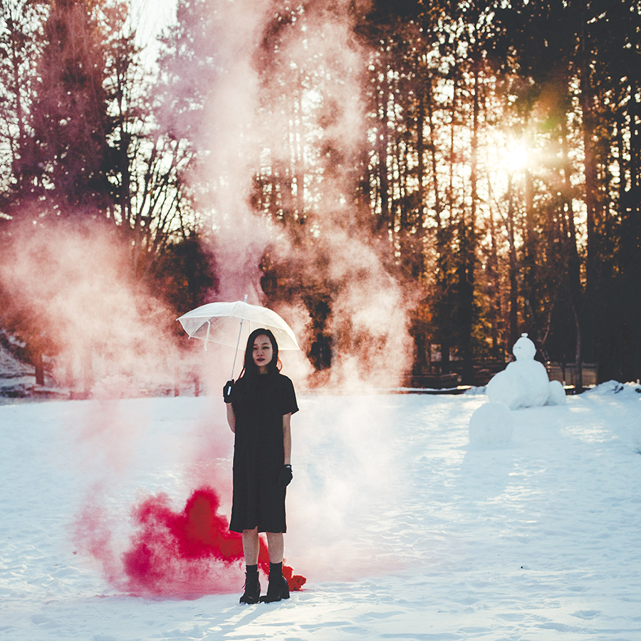 Winter Plumes: Red Enola Gaye smoke bomb in the snow photoshoot.