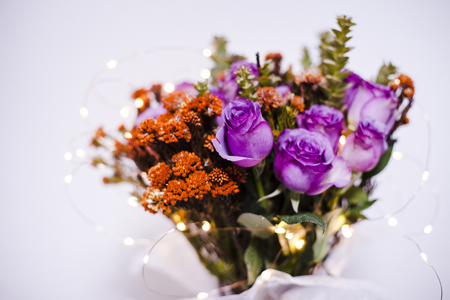 Christmas bouquet for the husband: Purple roses, orange Metalasia, Paranormus. Copper lights from Dresslily.