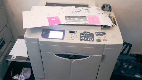 Animated gif of a Risograph printer in action.