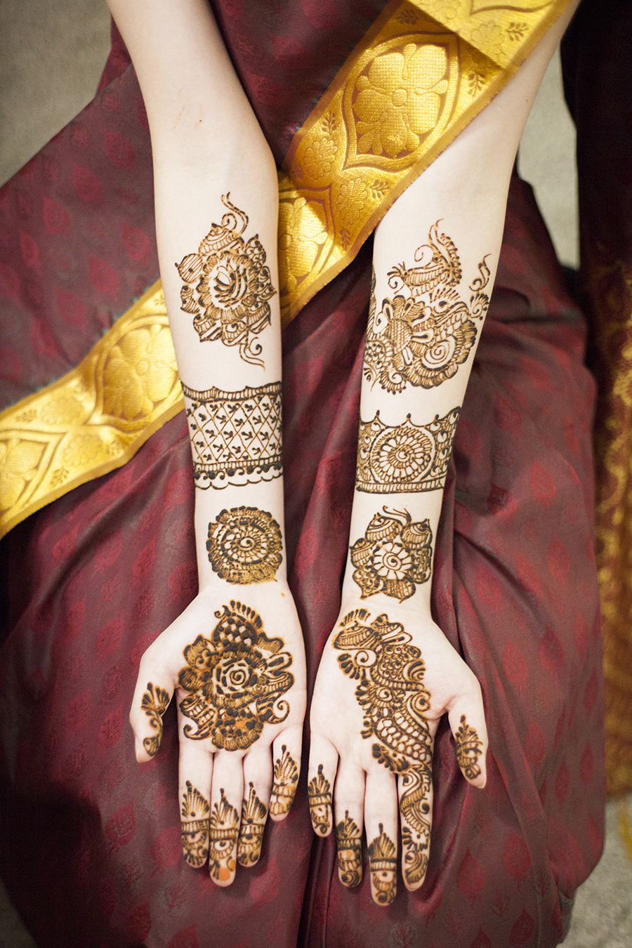 Arm henna against my saree.