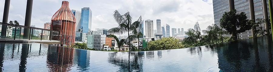 Panorama of infinity pool at the level 5 wellness floor at hotel PARKROYAL on Pickering, Singapore.