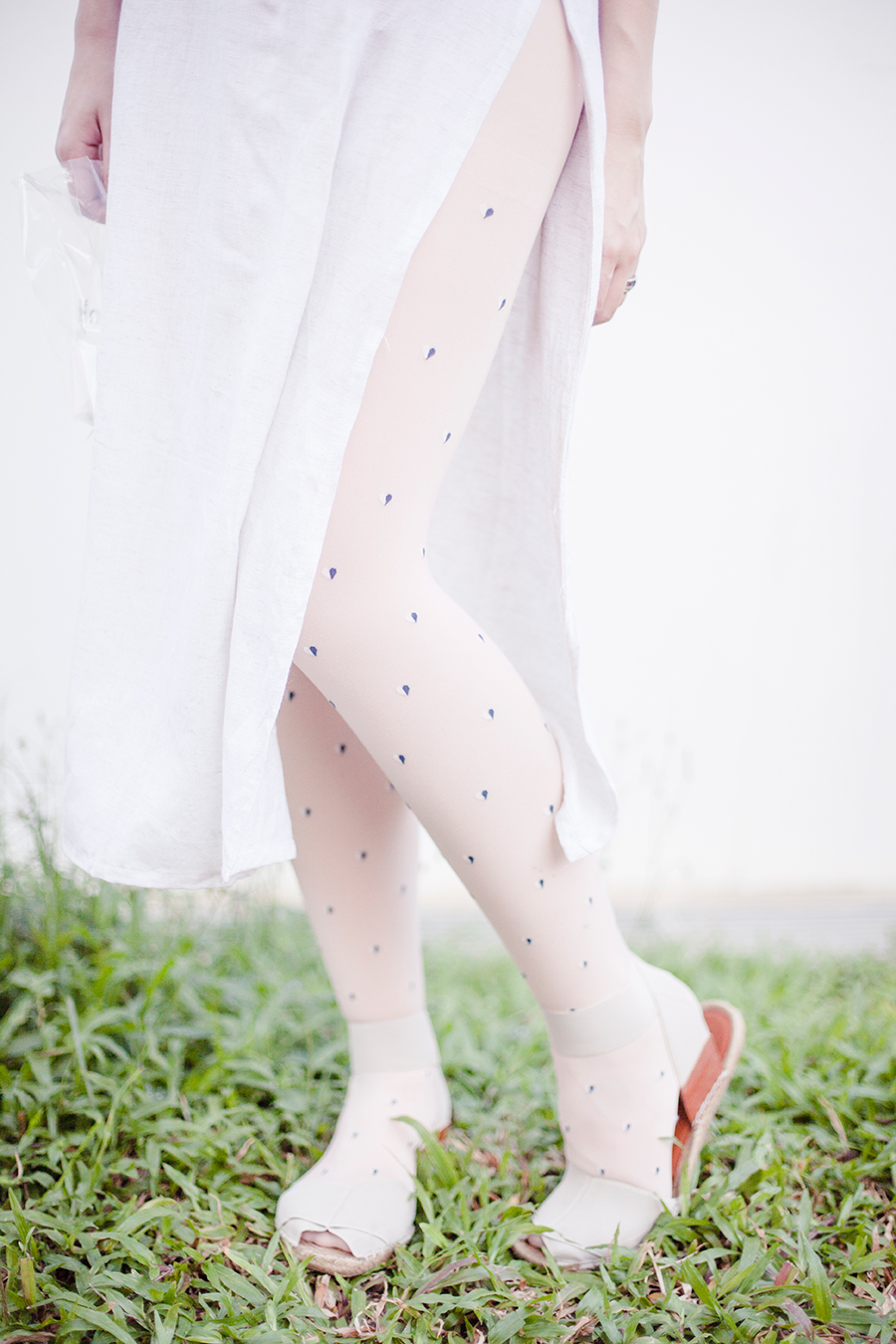 heart-patterned tights, Aldo wrap sandals.