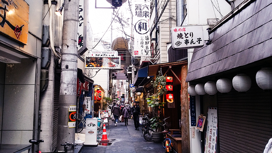 Alley filled with shophouses in Osaka, Japan.