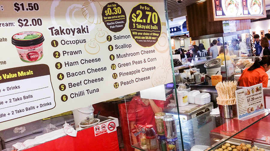 Takoyaki menu at a stall in Singapore.