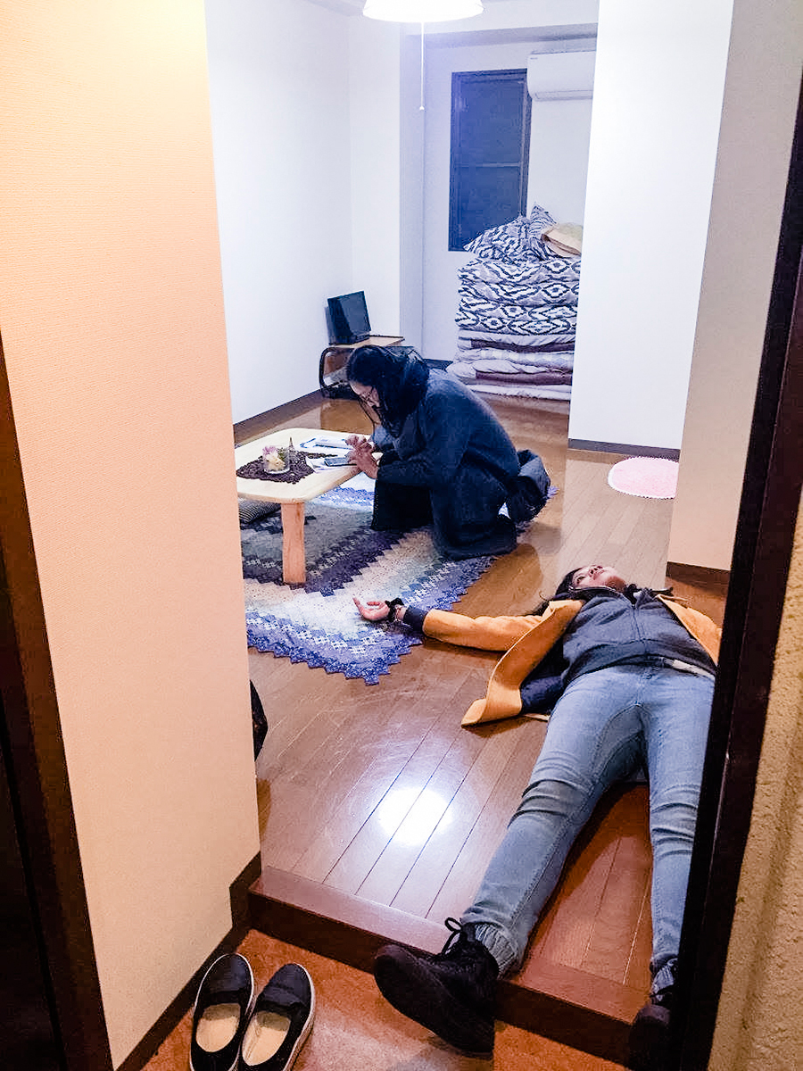Dead tired upon reaching our Airbnb in Osaka, Japan. Photo by Ruru.