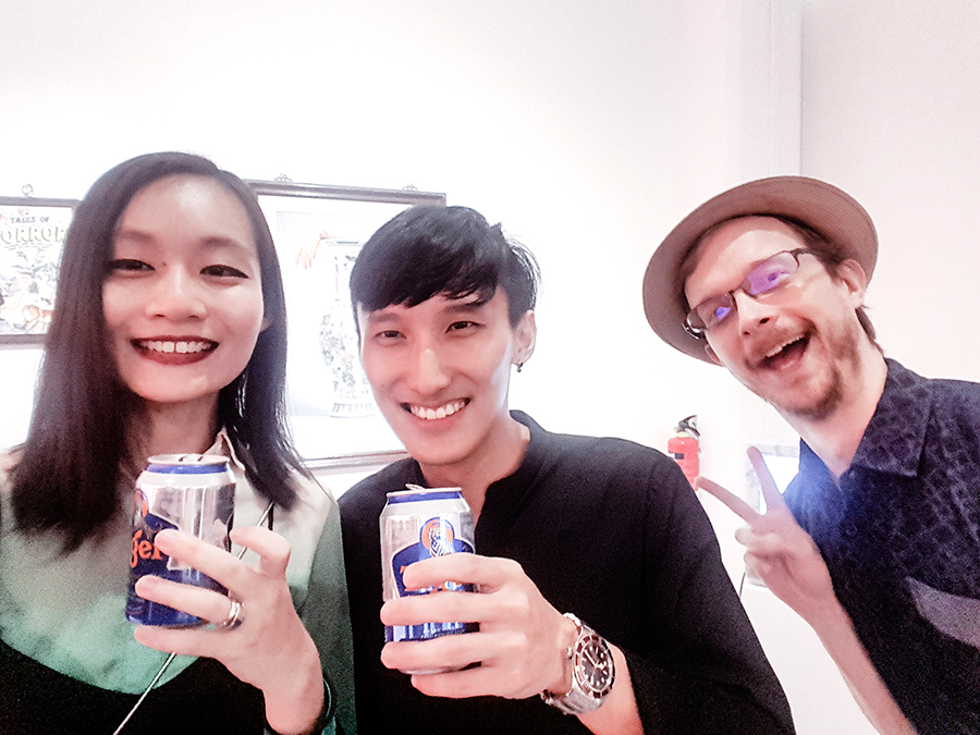 Chan + Hori Contemporary Mojoko 'Sick Scents' exhibition opening night: Tiger beer with Daryl Goh.