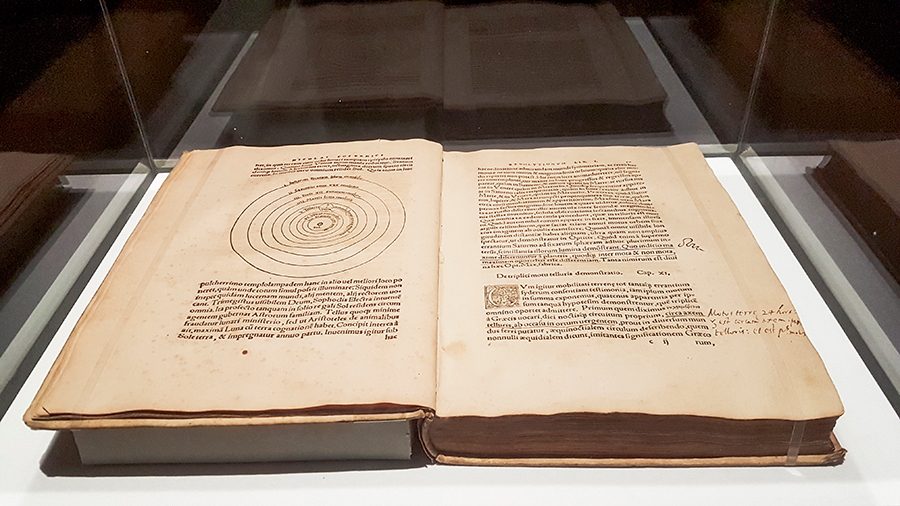 First edition book of De Revolutionibus Orbium Coelestium (On the Revolutions of the Heavenly Spheres) in 1543 by Nicolaus Copernicus at the The Universe and Art: An Artistic Voyage Through Space exhibition, ArtScience Museum Singapore.