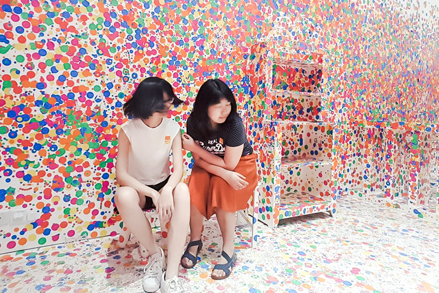 The Obliteration Room by Yayoi Kusama for the Children's Biennale at National Gallery Singapore.