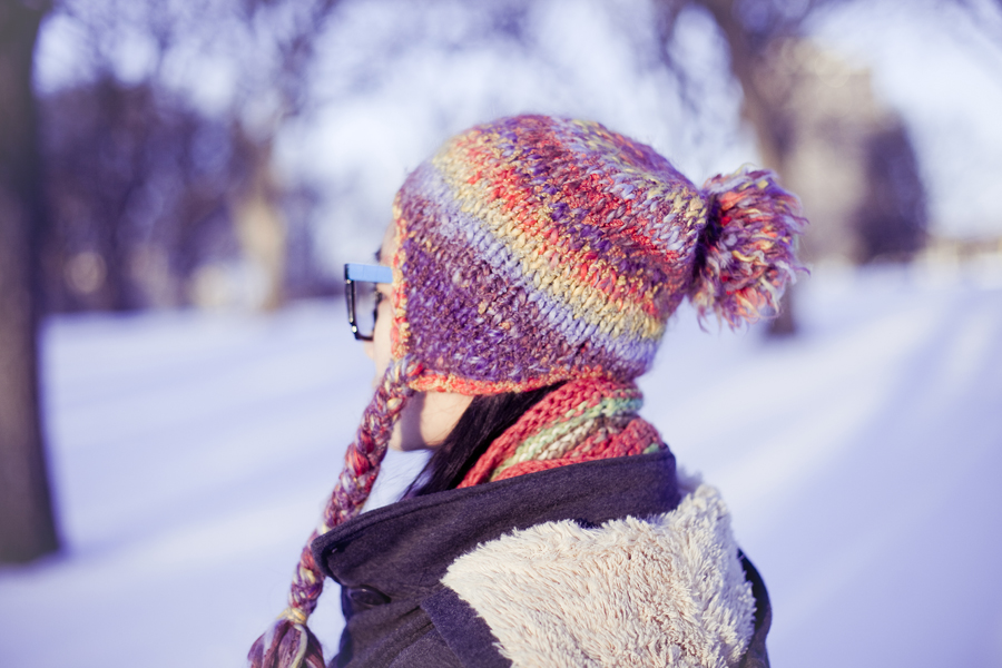 Photoshoot in the snow. Outfit details: Passport Love blue ruched dress, Urban Outfitters BDG patchwork jeans, Fox striped zigzag scarf, Forever21 colourful beanie, Dollhouse grey jacket, Fila black men's boots, geeky 8-bit glasses, T-shirt & Jeans patterned backpack.