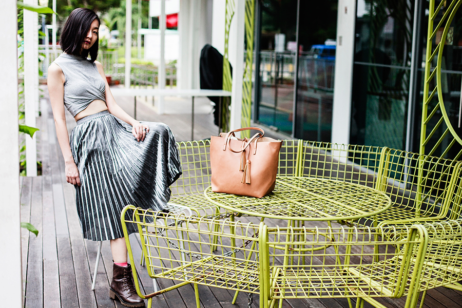 Chinese New Year outfit: Topshop grey twist crop top, Shein silver pleated skirt, Mango shopper tote bag, Steve Madden brown boots.