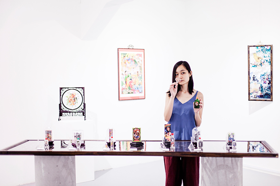 Smelling perfumes at Mojoko and Terry Jacobson 'Sick Scents' exhibition at Chan + Hori Contemporary, Singapore.